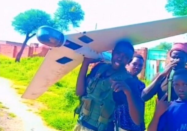 Sudanese soldiers display a downed drone in Dilling, South Kordofan, on August 7, 2026.