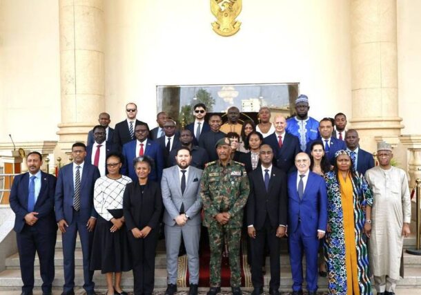 Sudan's Burhan pose with the visiting African Union delegation on August 16, 2026