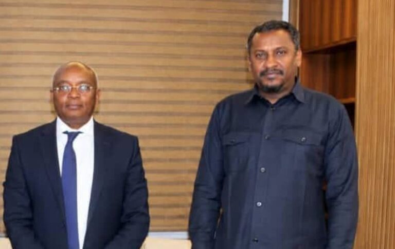 State Minister for Finance Mohamed Nur Abdel-Daim (L) poses with AfDB’s country manager for Sudan, David Muthusi Mutuku in Khartoum on Sept 15, 2026