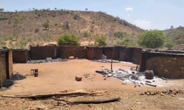 Burned homes in Kauda after deadly clashes in May 2026