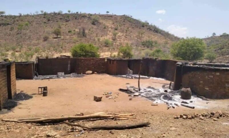 Burned homes in Kauda after deadly clashes in May 2026