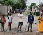 People stand outside their homes following a night of gunfire after security forces moved to arrest the former head of the intelligence service, in Juba, November 22, 2024. Reuters photo