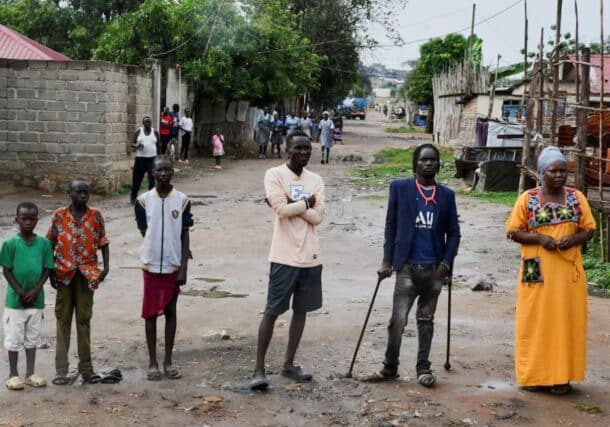 People stand outside their homes following a night of gunfire after security forces moved to arrest the former head of the intelligence service, in Juba, November 22, 2024. Reuters photo