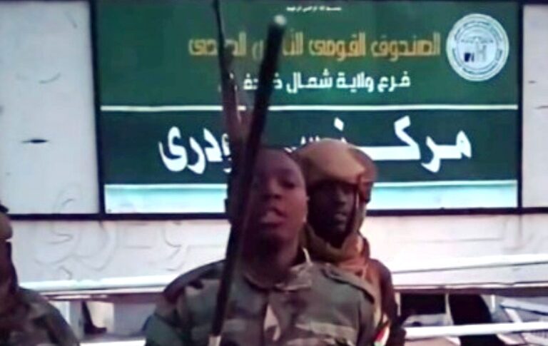 Sudanese soldiers pose outside a medical dispensary in Sodari, North Kordofan , on Sept 25, 2026