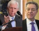 former U.S. Representative Frank Wolf (L) and former Ambassador Sam Brownback