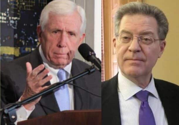former U.S. Representative Frank Wolf (L) and former Ambassador Sam Brownback