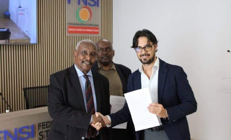 Yasir Arman, SPLM-RDC leader (L) shakes nads with Vittorio Di Trapani, President of the Federazione Nazionale Stampa Italiana in Rome on September 16, 2026