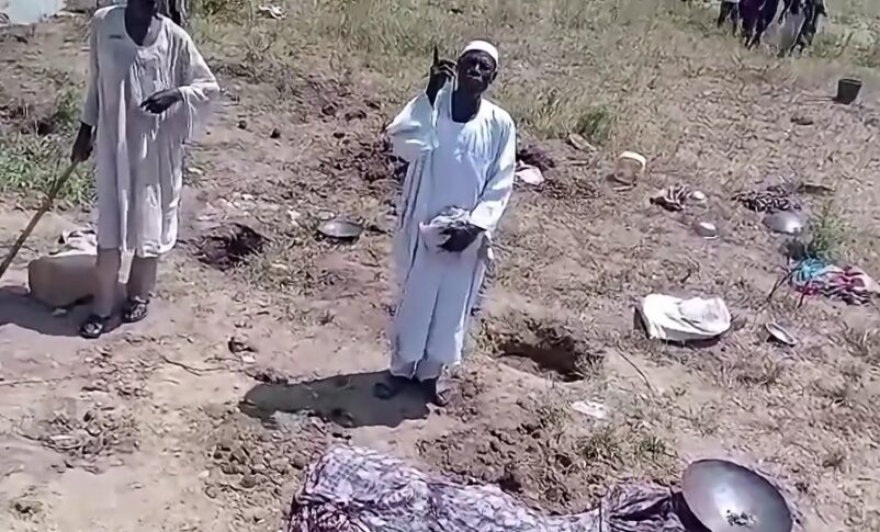 A survivor speaks near the site of an alleged RSF drone strike that killed 30 displaced people at a shelter in Wad al-Mahi, Blue Nile region, October 9, 2026.+