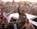Sudan's army chief Abdel Fattah al-Burhan waves to a crowd in Wadi Halfa, October 21, 2026.