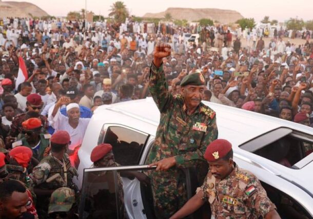 Sudan's army chief Abdel Fattah al-Burhan waves to a crowd in Wadi Halfa, October 21, 2026.