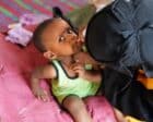 An infant boy receives the nOPV polio vaccine at home in Port Sudan, Red Sea State, on the first day of a campaign aiming to protect 11 million children from polio, October 26, 2026. WHO/Handout