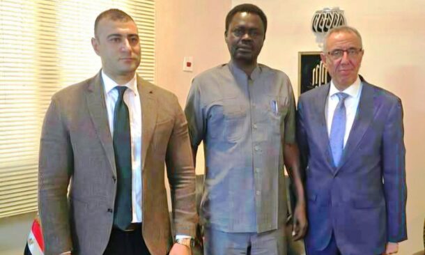 Minni Minawi, Darfur governor poses with Yasir Ali Saroor (R) Egypt ambassador to Khartoum and another diplomat on October 14, 2026