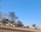 Smoke rises from burning buildings following a drone attack in the Bamna area of Chad, Oct. 20, 2026.