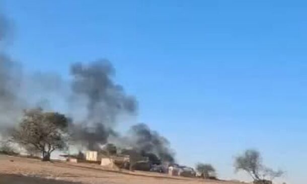 Smoke rises from burning buildings following a drone attack in the Bamna area of Chad, Oct. 20, 2026.
