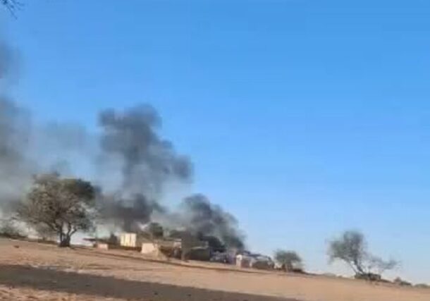 Smoke rises from burning buildings following a drone attack in the Bamna area of Chad, Oct. 20, 2026.