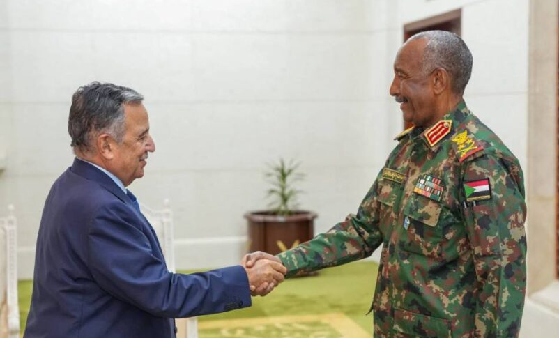 Sudan Sovereign Council chairman Abdel Fattah al-Burhan shakes hand with Nabil Fahmy Arab League SG on Oct 26, 2026