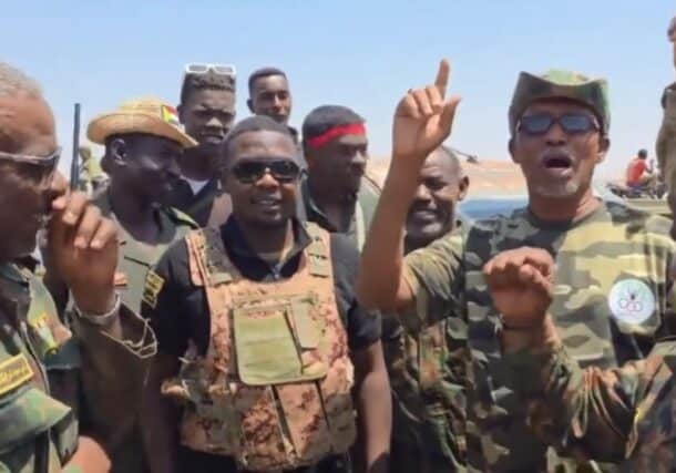 Members of the Sudanese armed forces celebrate after capturing Al-Mazroub from the paramilitary RSF, in North Kordofan, October 2, 2026
