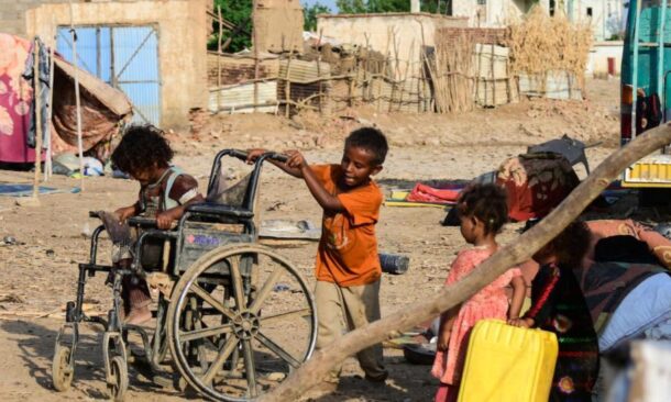 Sudanese children play on a street in Tokar, in Red Sea State, following heavy flooding in October, 2024 , AFP file photo