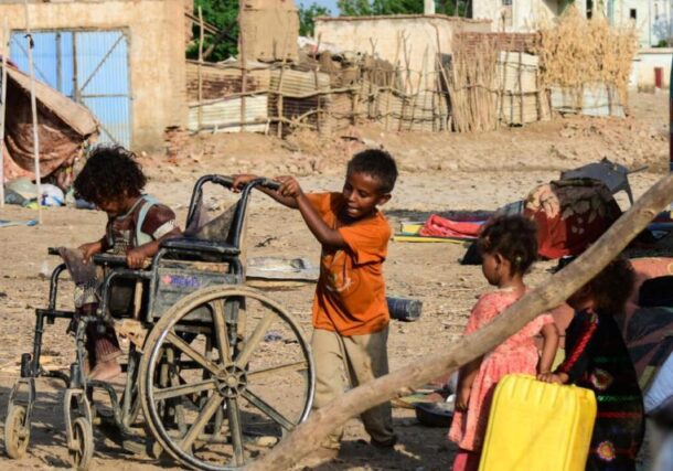 Sudanese children play on a street in Tokar, in Red Sea State, following heavy flooding in October, 2024 , AFP file photo