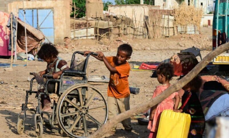 Sudanese children play on a street in Tokar, in Red Sea State, following heavy flooding in October, 2024 , AFP file photo