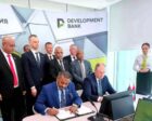 Sudan’s State Minister of Finance (L) and the CEO of the Development Bank of Belarus sign an export financing agreement between the two countries in Minsk. Oct 2, 2026
