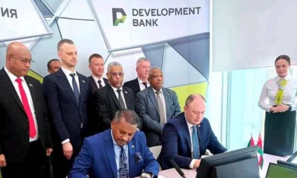 Sudan’s State Minister of Finance (L) and the CEO of the Development Bank of Belarus sign an export financing agreement between the two countries in Minsk. Oct 2, 2026