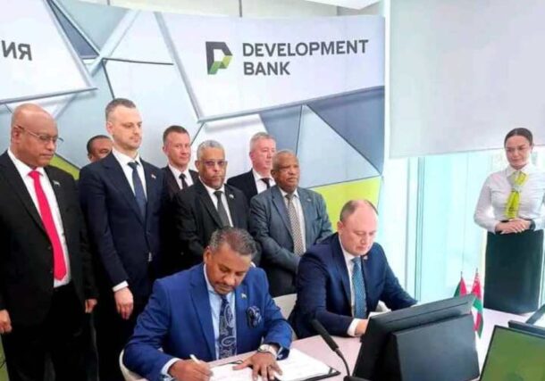 Sudan’s State Minister of Finance (L) and the CEO of the Development Bank of Belarus sign an export financing agreement between the two countries in Minsk. Oct 2, 2026